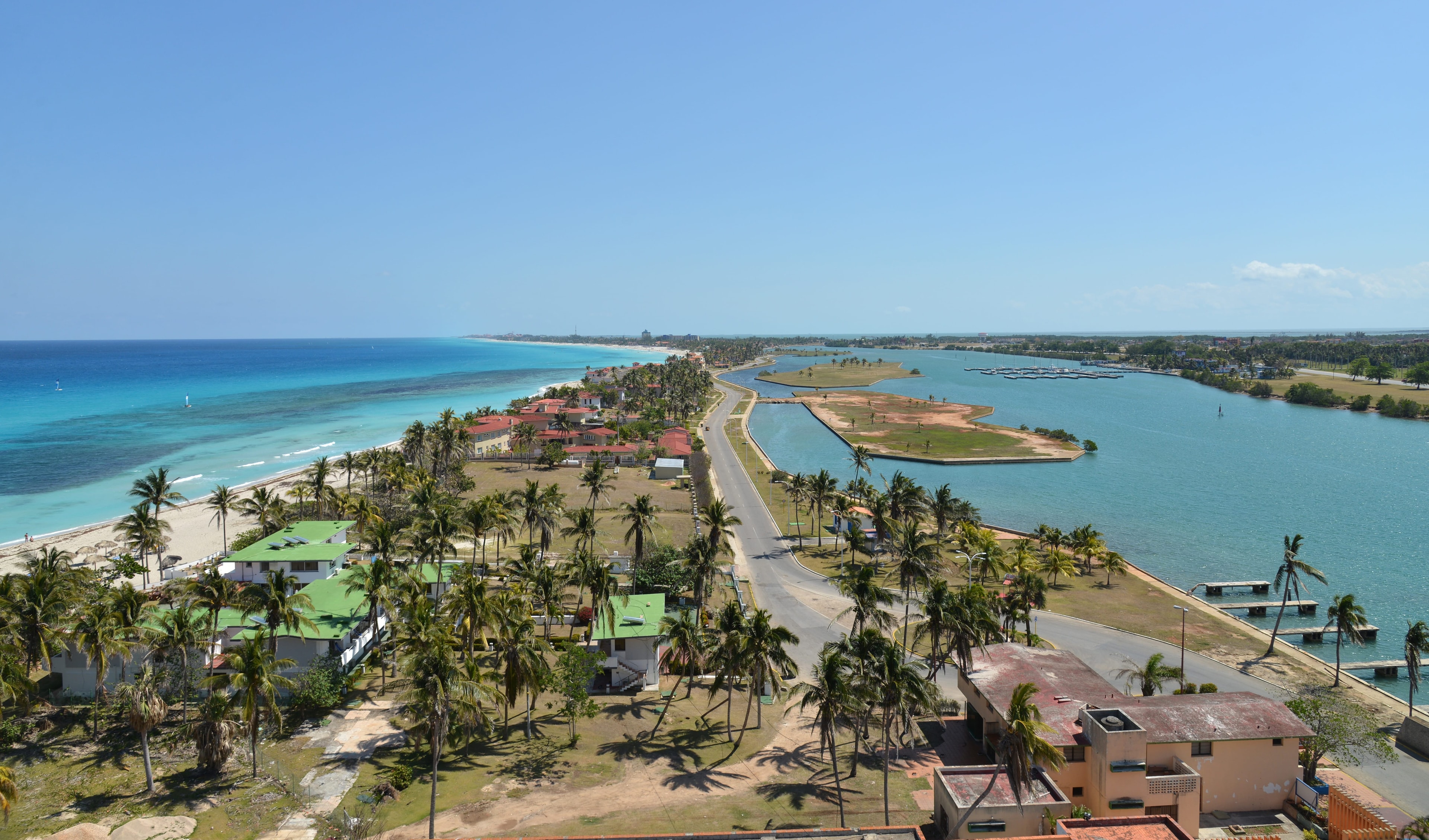 Aerial view of Varadero peninsula with turquoise Caribbean sea, palm trees, and marina, Cuba