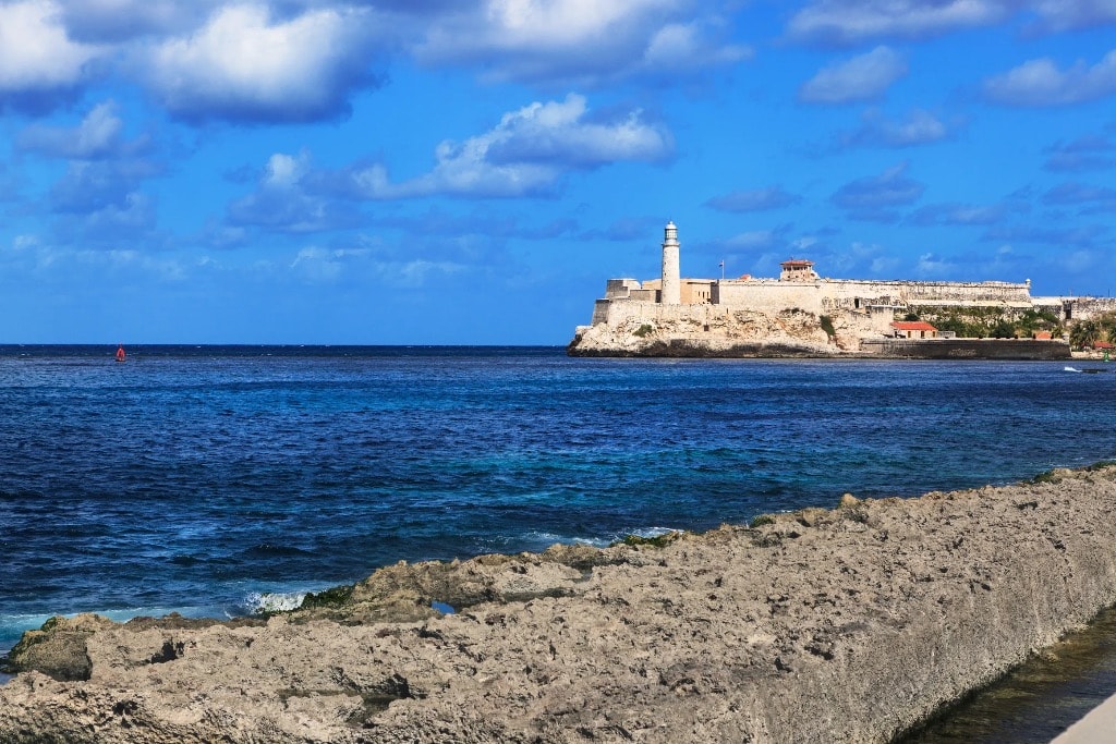 Castillo del Morro lighthouse over turquoise sea Cuba
