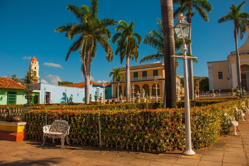 Trinidad Cuba colonial plaza with garden and palm trees