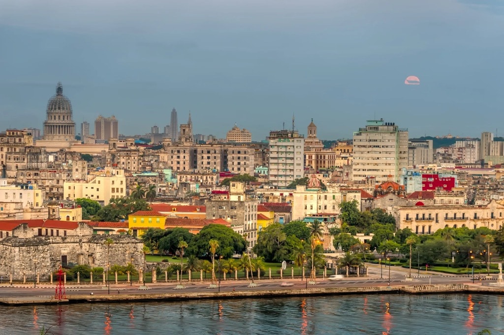 Havana skyline from the bay with Capitol dome and full moon rising